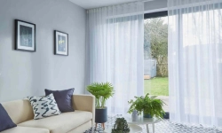 New sheer curtain installed in modern living room