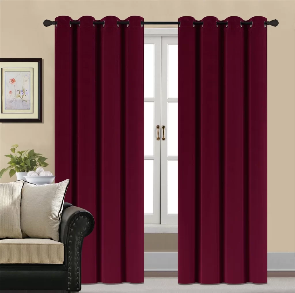 Two-burgundy-velvet-curtains-on-a-window