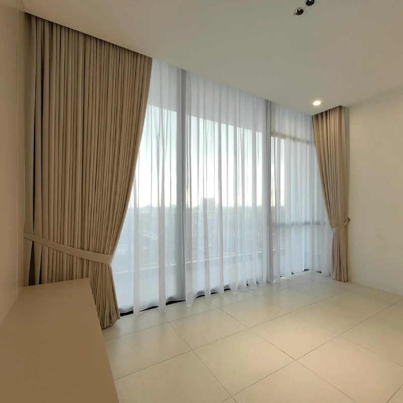 Elegant sheer with beige curtains Dubai delivering soft lighting, modern trends and premium window décor in palm jumeriah.