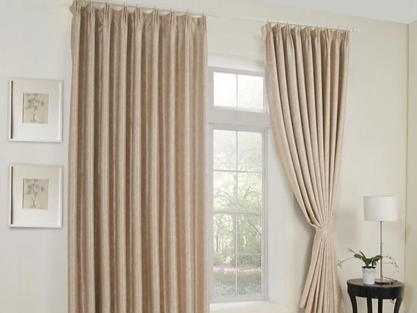 Ready-made beige curtains Dubai upgrade your living room with a unique and luxurious style.