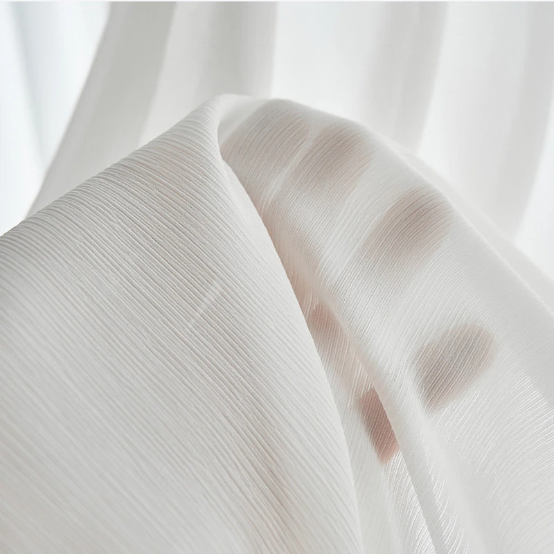 Soft Voile sheer Curtains in white, showing a fine ribbed texture and light-filtering quality.