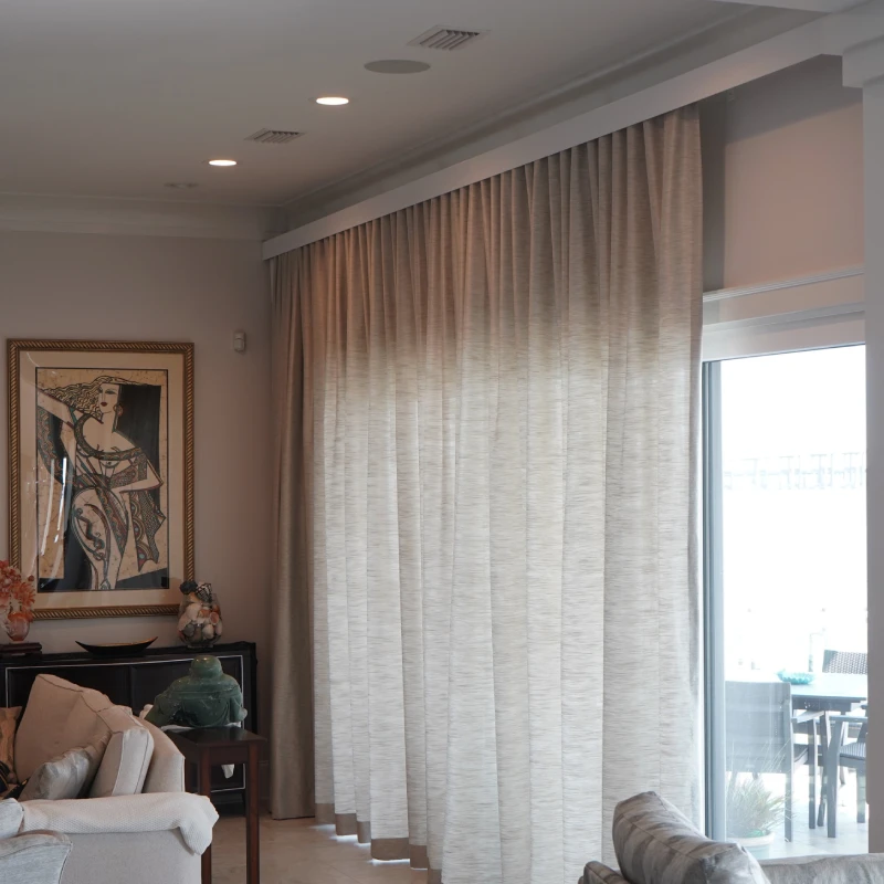 Automatic hotel-grade motorized curtains installed in a premium high-rise hospitality setting.