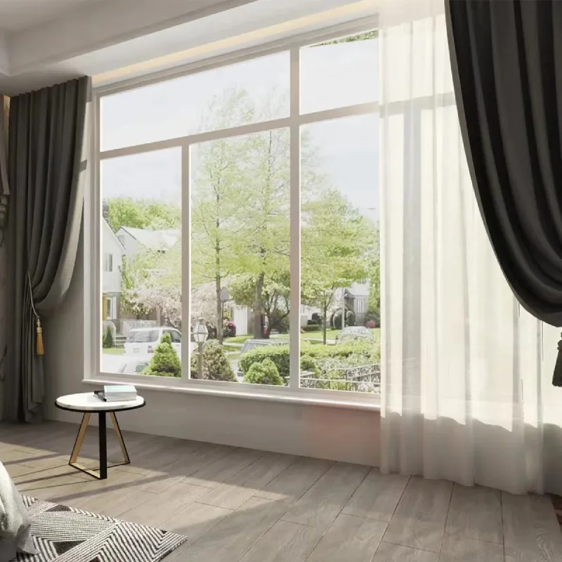 Bright, airy balcony with motorized white sheer & blackout curtains for automated light control and privacy.