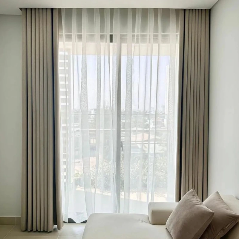High-quality motorized curtains Dubai for floor-to-ceiling window in bedroom