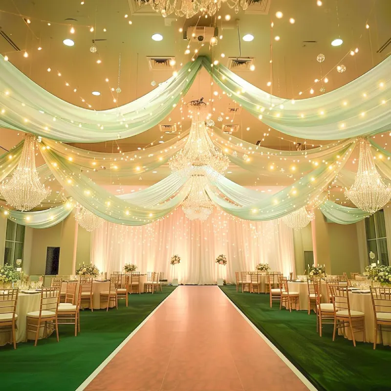 Luxurious floor-to-ceiling ballroom curtains in a grand Dubai venue with elegant white draping.