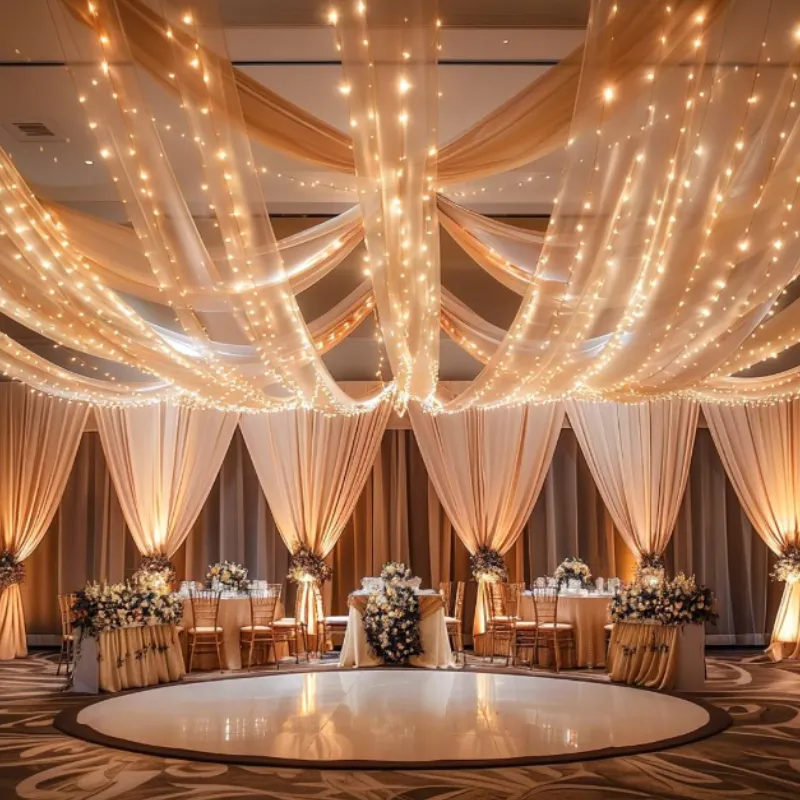 Luxurious white ballroom curtains with floor-to-ceiling drapes in a grand Dubai event venue.