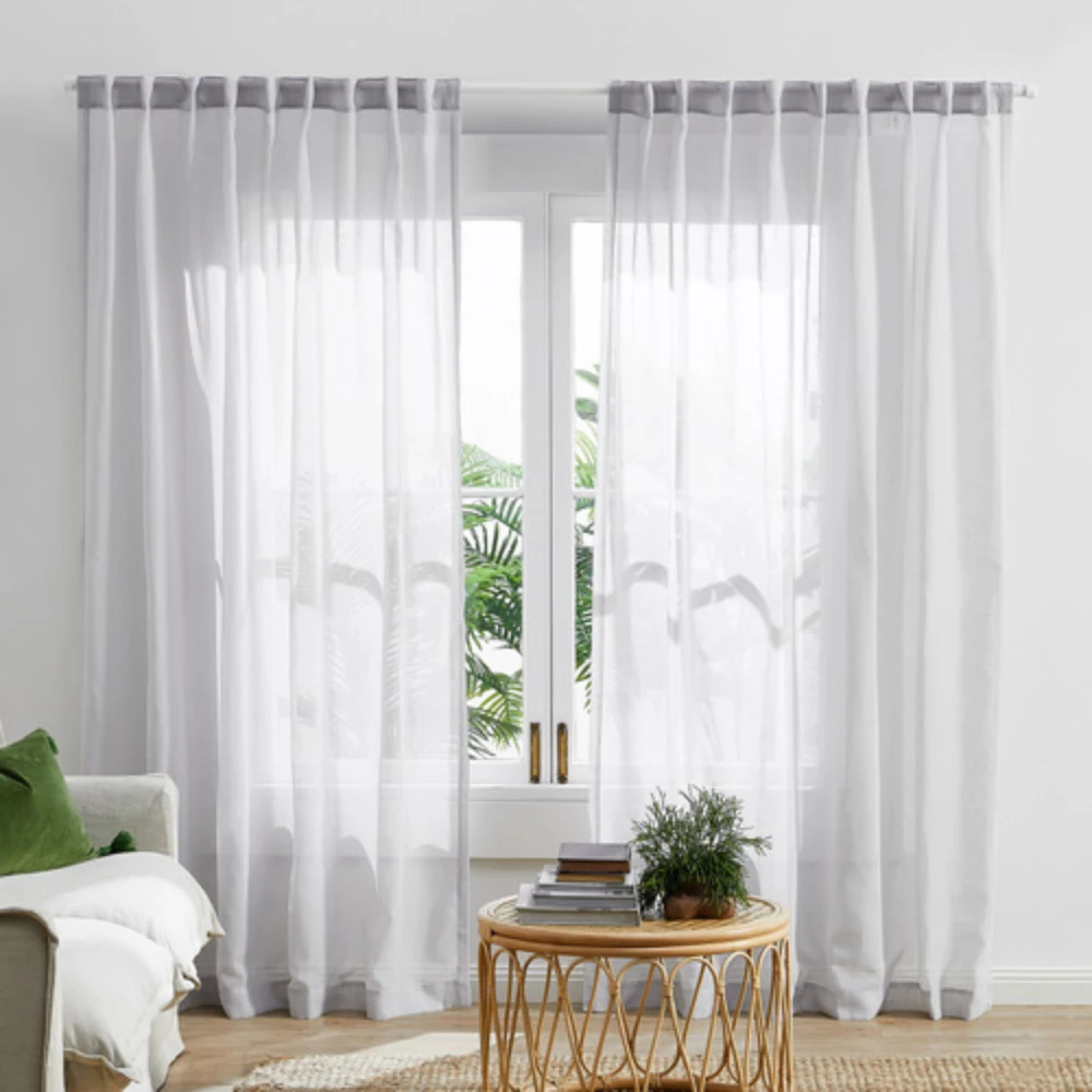 Premium Tab Top Sheer Curtains with delicate fabric for a luxurious interior.