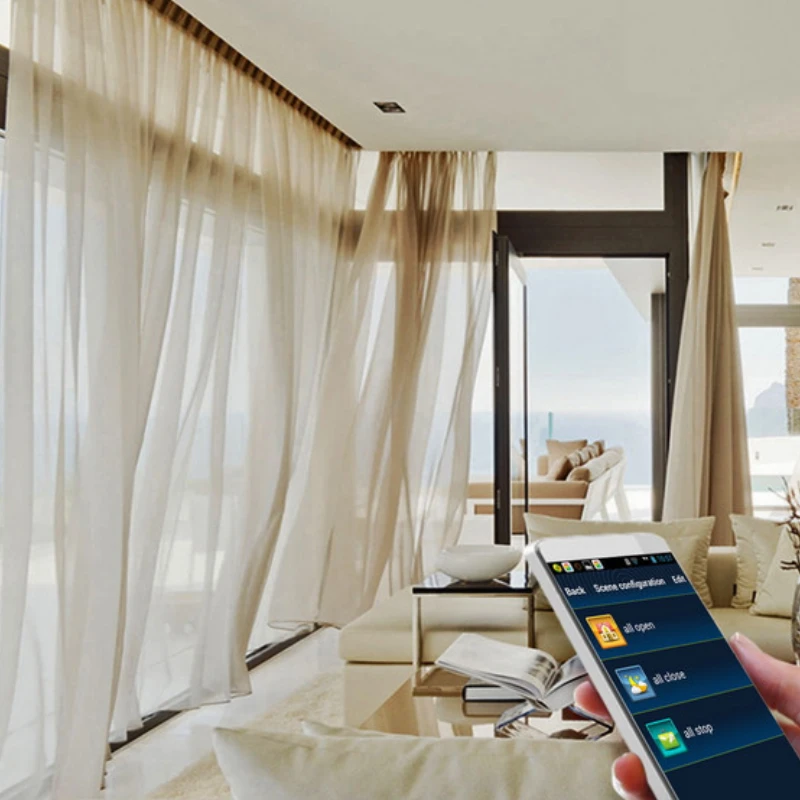 Smart home setup with ceiling-mounted motorized curtains framing a large scenic window view.